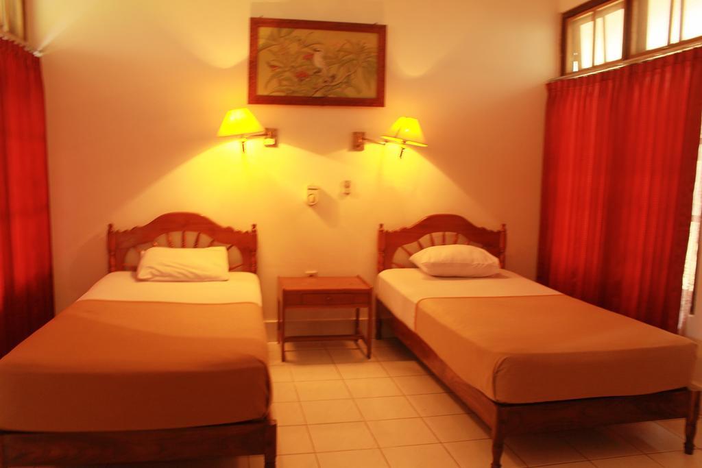 Hotel Angsoka Temukus Quarto foto
