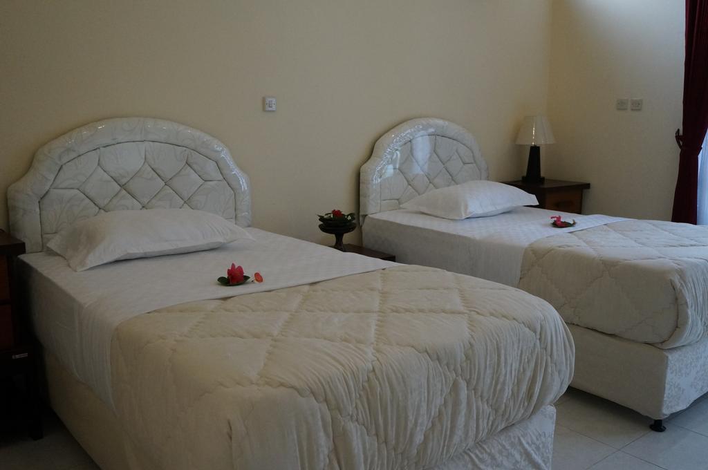 Hotel Angsoka Temukus Quarto foto